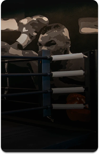 Стопка боксерських рукавичок та тренувального обладнання для професійних боксерських занять у Synergy Fitness